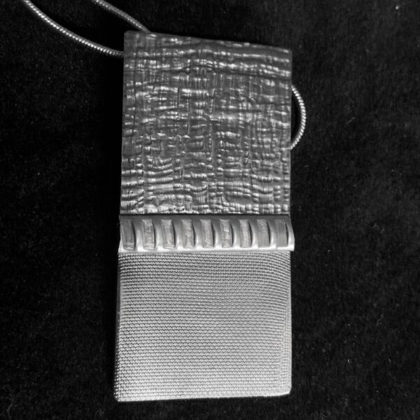 Embossed Bar on Textured Sterling