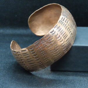 Hand forged and textured concave copper cuff