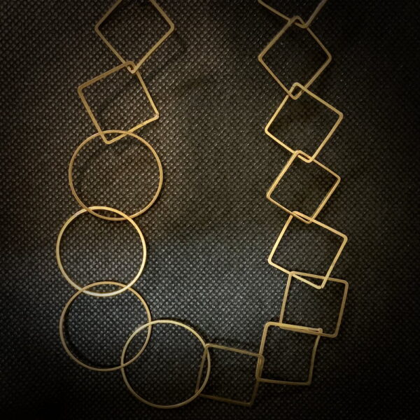 Polished upcycled brass circles & squares, large and small. Various lengths, continuous necklace; no clasp.