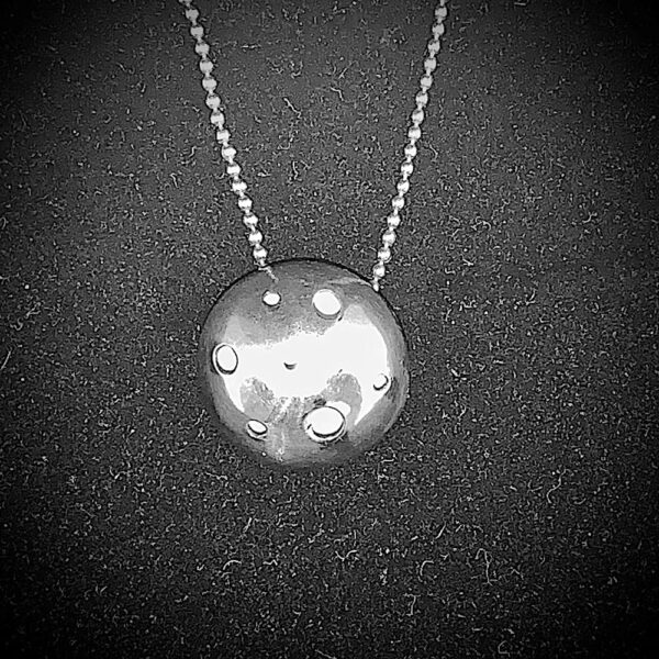 Pierced, polished sterling silver half round (flat back) dome. 18" oxidized mini plumber's chain