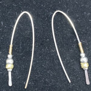 Petite and elegant silver wires, adorned with decorative silver and brass beads. Gold-filled wire wrapped at the top.